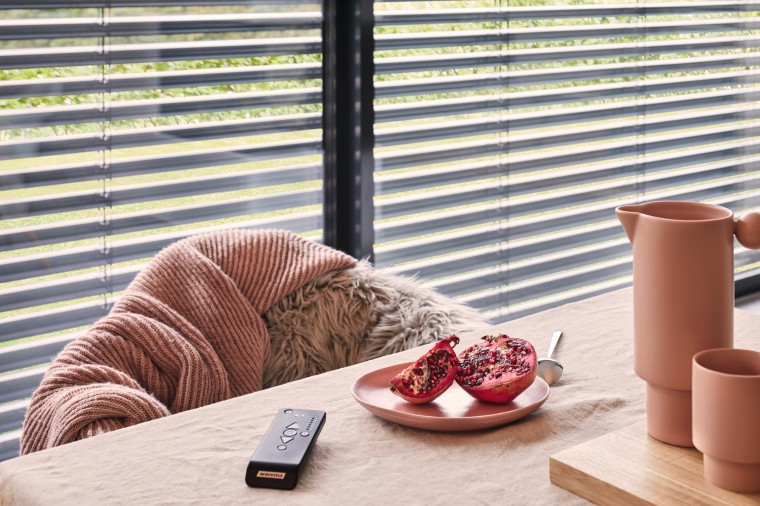 External Venetian blinds for solar heat and glare control